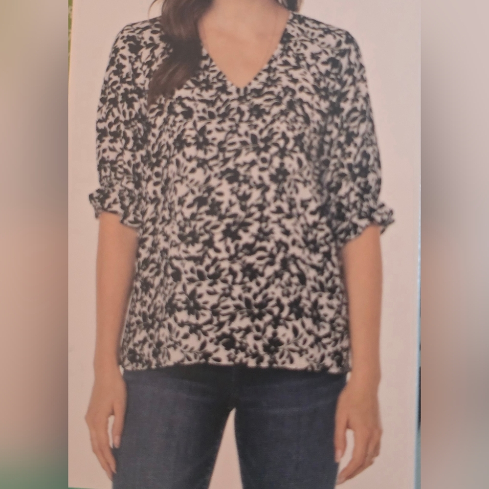 Well Worn V-neck black and white floral Blouse with Ruffled sleeves, siz…